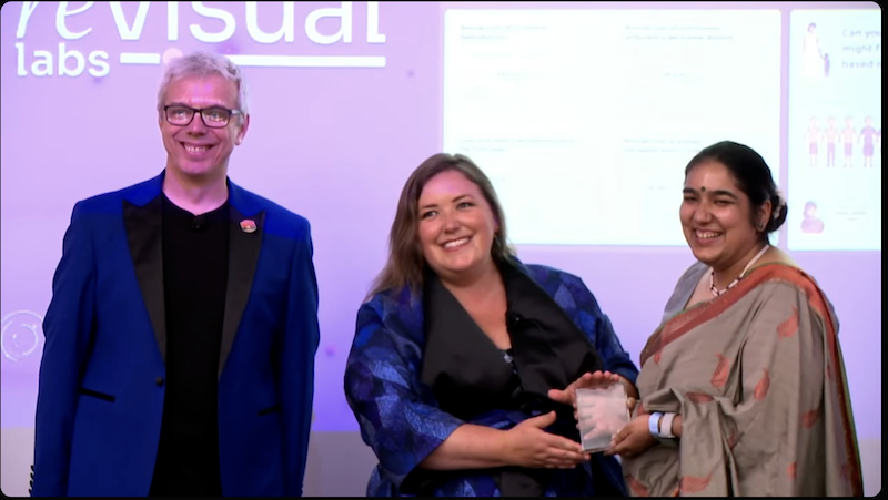 Receiving the trophy on stage at the Information Is Beautiful Awards ceremony in Miami